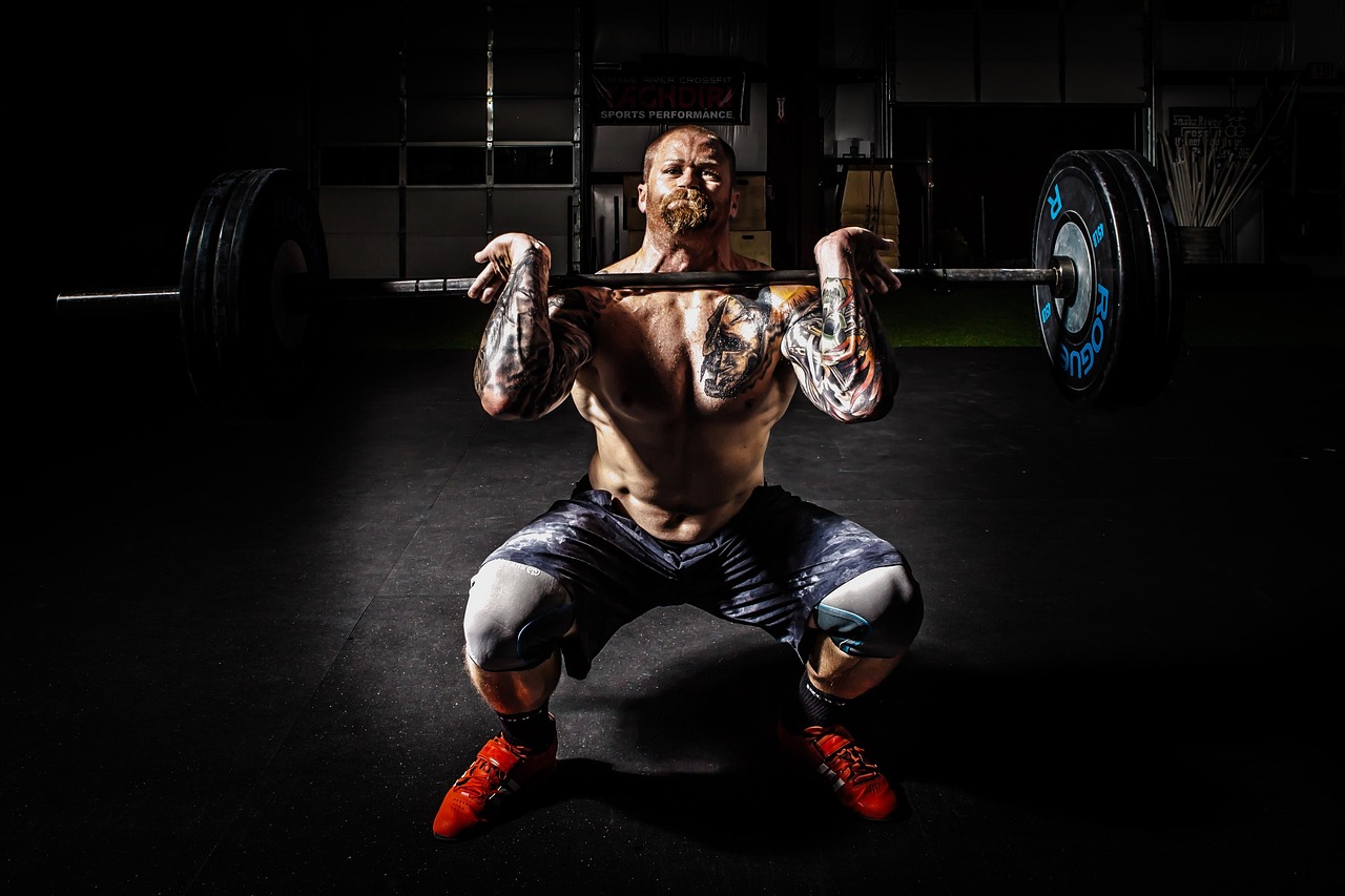 women powerlifting training gym